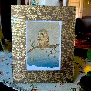 Pretty owl print in frame.